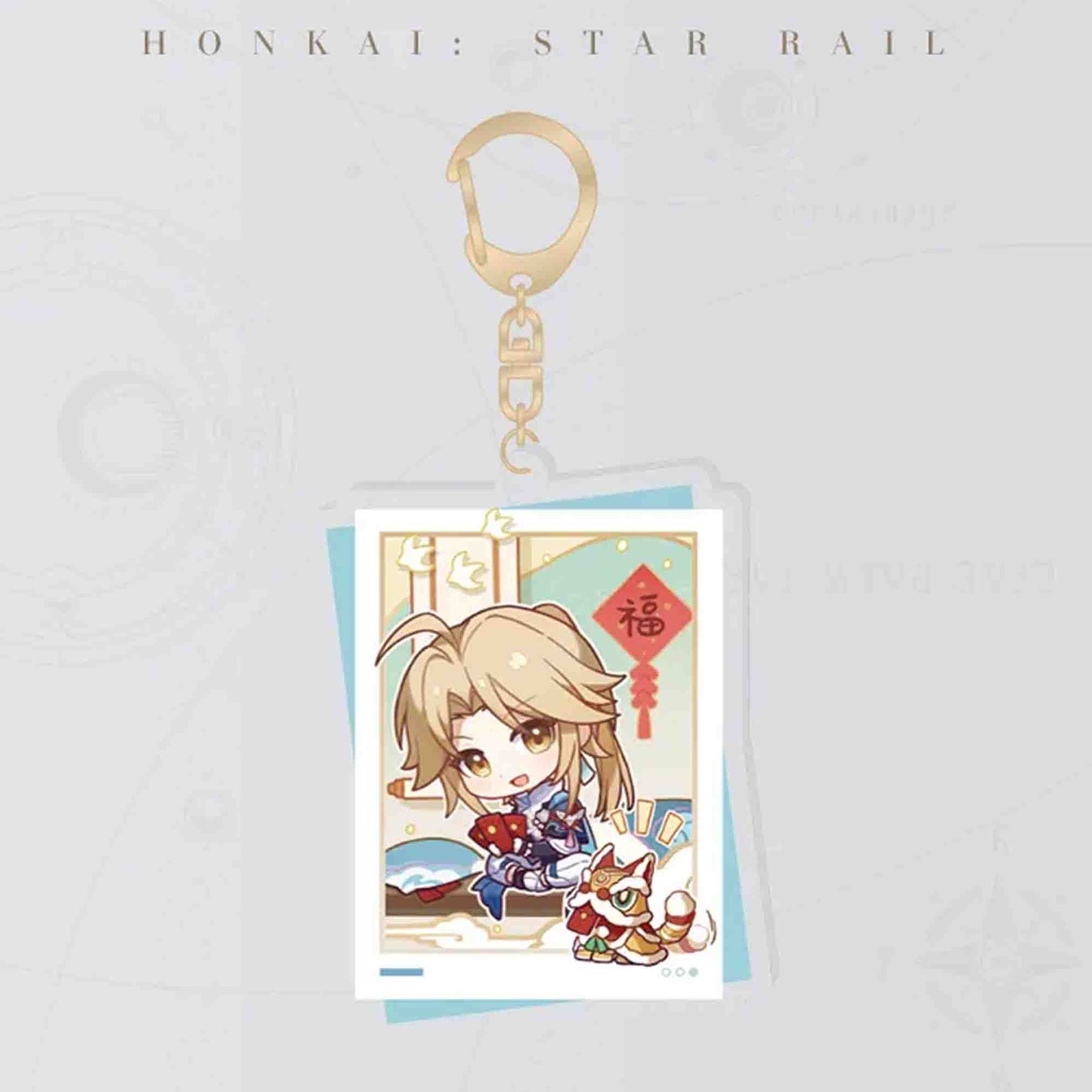 A single Honkai: Star Rail acrylic keychain with a gold clasp. The polaroid-style charm depicts a blonde chibi character with a "Fu" (fortune) decoration and a small dog figure.