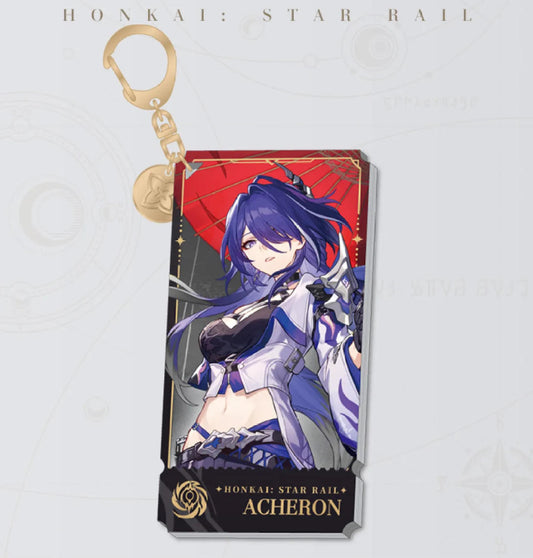 This is a long acrylic keychain featuring Acheron from Honkai: Star Rail. The design shows Acheron against a backdrop dominated by her iconic red umbrella, with her purple-and-black outfit exuding a cool, battle-ready vibe. Gold edging and a black base printed with her name and game logo enhance the luxurious feel, while a gold lobster clasp and extender chain make it both stylish and functional.