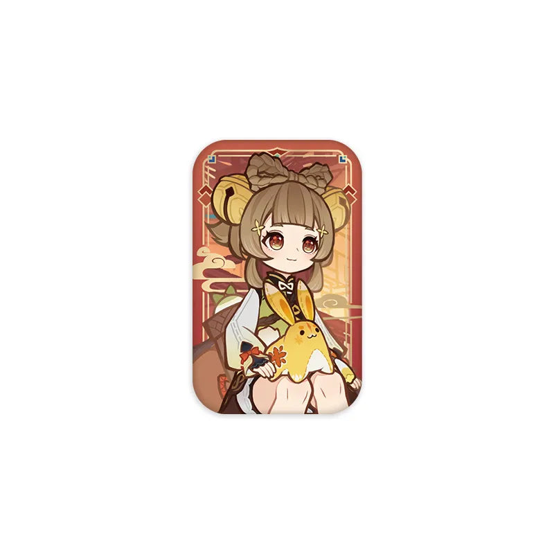 Rounded square Genshin Impact collectible pin from the Colorful Kites Combing The Spring Breeze series, featuring Yaoyao in a festive Lunar New Year design.
