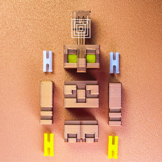 Copper Golem self-assembly kit with individual block-style parts laid out neatly on a copper-colored surface.