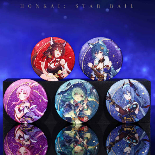 Five badges (Tingyun, Yukong, Hanya, Huohuo, Xuanyuan) displayed on a reflective black stand, with a starry blue backdrop highlighting their glittery bases.