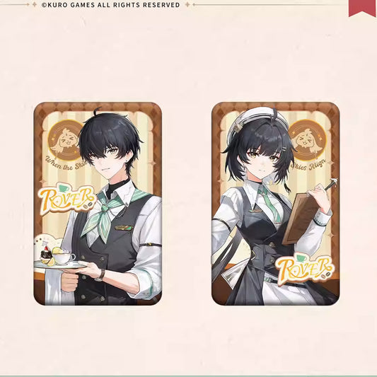 Two square badges of Wuthering Waves' Rover in café uniforms rest on a checkered tray. One holds a menu, the other a coffee set, with warm golden details.