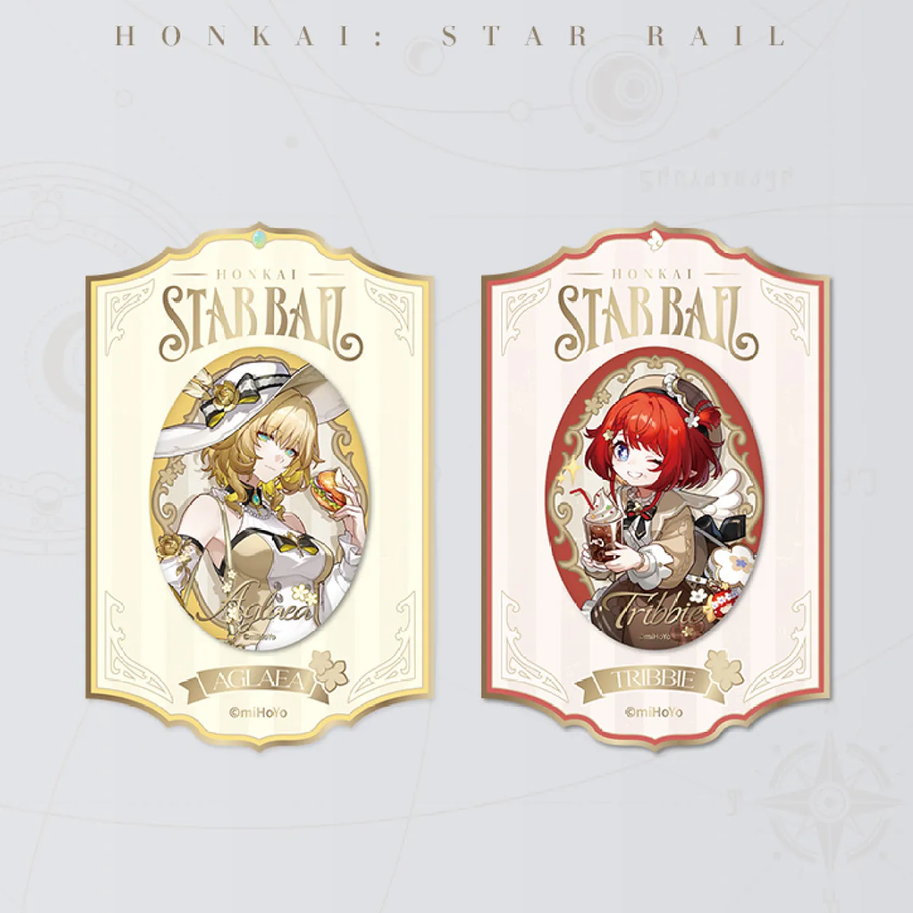 This display set features two themed cards with embedded oval badges of Aglaea and Tribbie from Honkai: Star Rail. The cards have elegant “STARBALL” branding and decorative borders, making them a polished, display-ready addition to any fan’s collection.