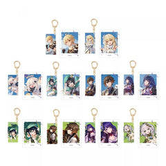Each keychain has a golden metal ring and a rectangular charm with a different character illustration. The characters have various hairstyles and outfits, with backgrounds in colors like blue and green. 