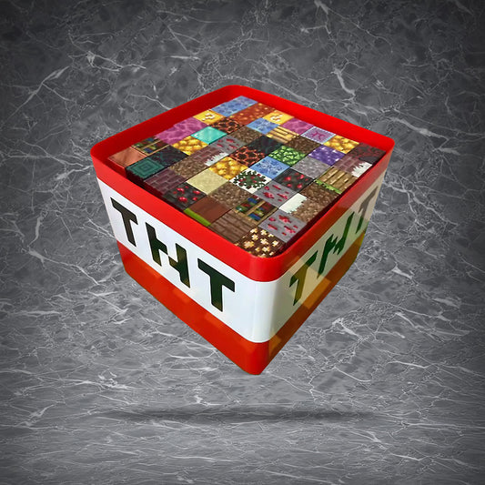 Minecraft-inspired magnetic building blocks set inside a red TNT storage box, featuring pixelated textures like dirt, stone, and ore.