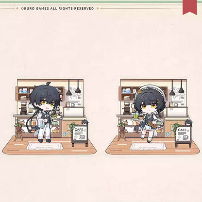 Two chibi-style magnetic acrylic stands of the Male and Female Wanderers from Wuthering Waves, featuring a cozy cafe backdrop with detailed kitchen elements and "CAFE" signage.