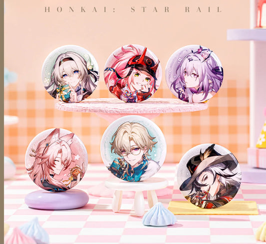 A display of six character pins from the Cosmic Candy House series, arranged on pastel-colored platforms against a retro checkered background. Each pin features vibrant anime-style artwork with a sparkling iridescent finish.