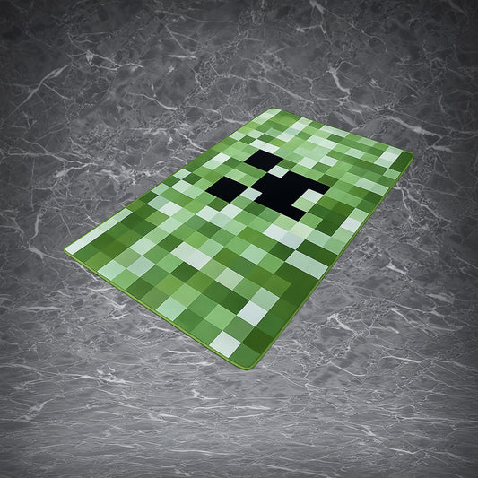 Green pixel-style Creeper carpet with a square face design, displayed flat on a dark marble surface for home floor decor.