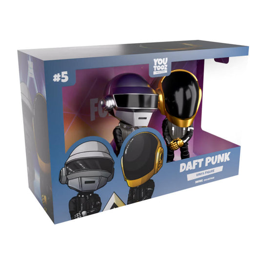 A Daft Punk chibi vinyl figure set is displayed in its open packaging box. The box features a blue and purple gradient design, with printed illustrations of the two figures alongside the actual collectibles inside, marked with #5 and labeled as a vinyl figure.