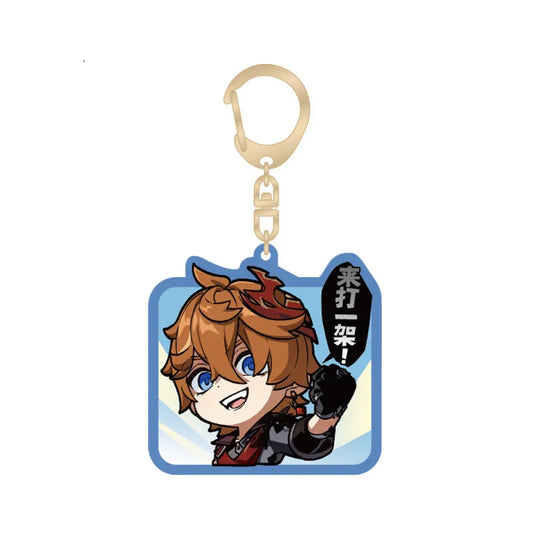 Chibi-style acrylic keychain featuring Tartaglia, with a playful “Fight Me!” text bubble. The charm has a blue die-cut border and is attached to a gold-toned lobster clasp and key ring, set against a plain light pink background.
