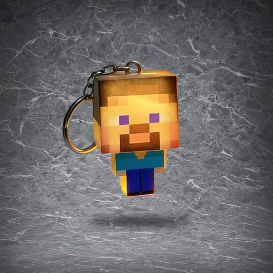 Steve character glow keychain with a pixelated design, emitting warm light, inspired by the Minecraft protagonist.