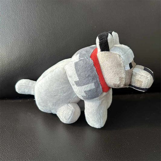 Gray Wolf Enderman Figurine plush toy, side view, soft fabric with red collar, lying pose on a dark background