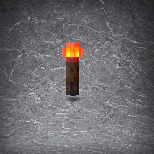 Life-sized Minecraft rechargeable redstone torch lamp with pixelated glow, rechargeable for lasting light. A must-have for gamers, styled against a sleek marble backdrop.