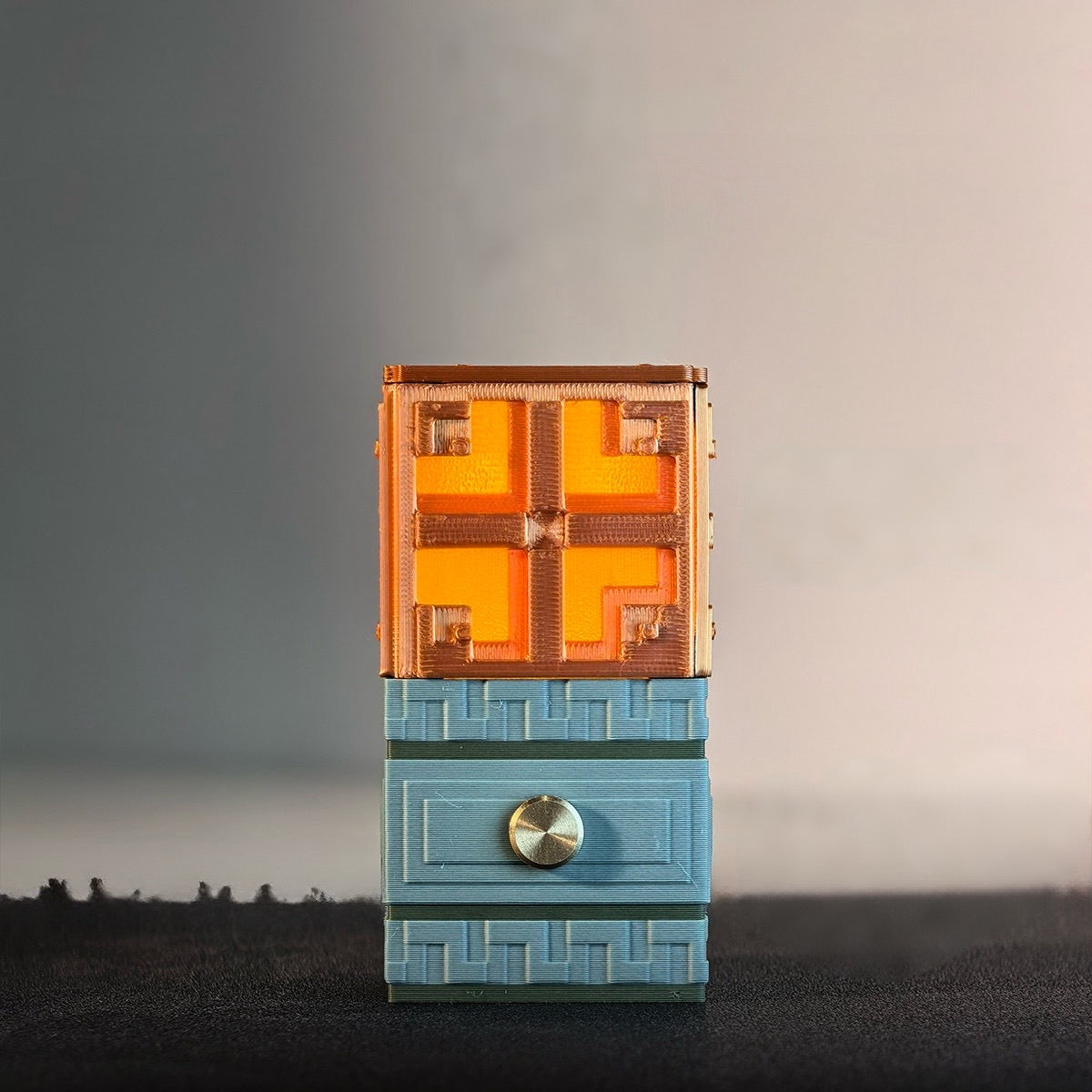 Minecraft Copper Bulb night light with a warm orange glow and a textured grey base for gaming room decor.