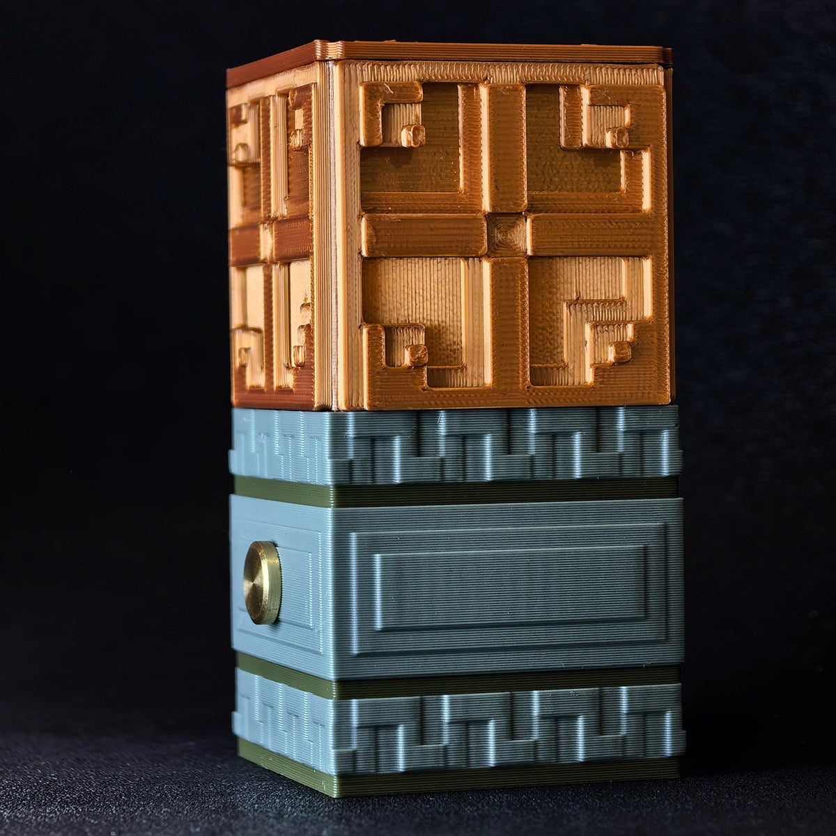 3D printed Minecraft Copper Bulb ornament with a copper top, grey tuff base, and circular gold touch sensor.
