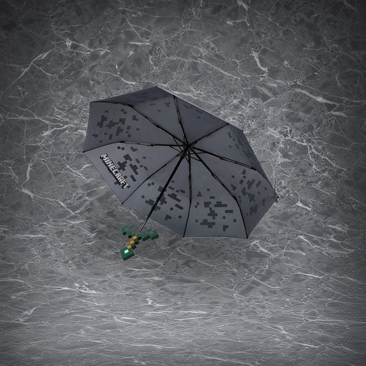Minecraft diamond sword umbrella with pixelated canopy and silicone hilt handle, perfect rainy day gear for game fans.