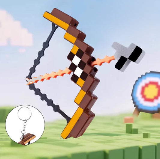 Functional Minecraft Mini Bow and Arrow Charm keychain, displayed against a vibrant, pixelated Minecraft landscape with a target in the background.