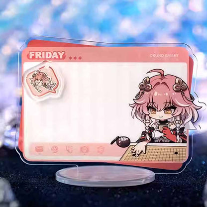This Friday-themed acrylic message standee from Wuthering Waves shows a chibi Changli playing Go, with a pink frame and a clear message board.