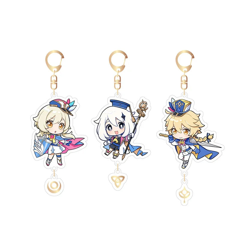 Genshin Impact 2023 Offline Event Acrylic Keychain Set featuring chibi-style Lumine, Paimon, and Aether, with retro pop-art designs, elemental charm pendants, and gold-toned keyrings.