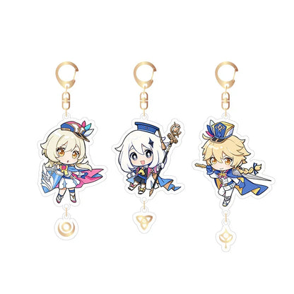 Genshin Impact 2023 Offline Event Acrylic Keychain Set featuring chibi-style Lumine, Paimon, and Aether, with retro pop-art designs, elemental charm pendants, and gold-toned keyrings.
