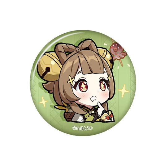 This adorable chibi Yaoyao badge features her starry-eyed expression, golden bells, and a floating donut, set on a green background, perfect for fans of the Liyue healer.