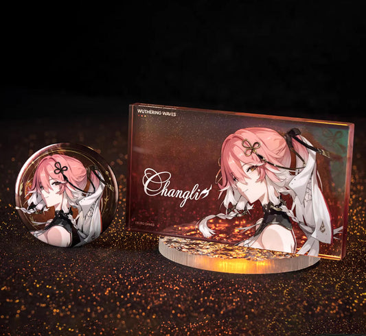 This 140×80×10mm acrylic block showcases Changli from Wuthering Waves, with her pink hair against a fiery red holographic backdrop. The glitter effect enhances the vibrant, fiery design.