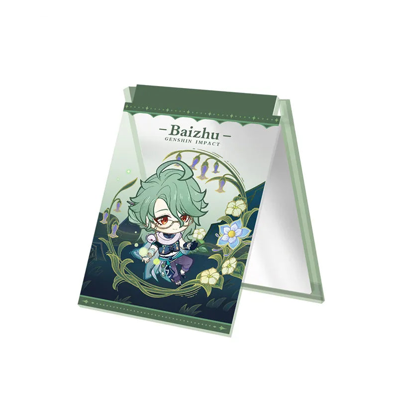 Chibi-style acrylic folding mirror featuring Baizhu, with a lush, botanical design of vines, flowers, and dark green foliage. The mirror unfolds into a stand, displaying the character’s name at the top against a plain light pink background.