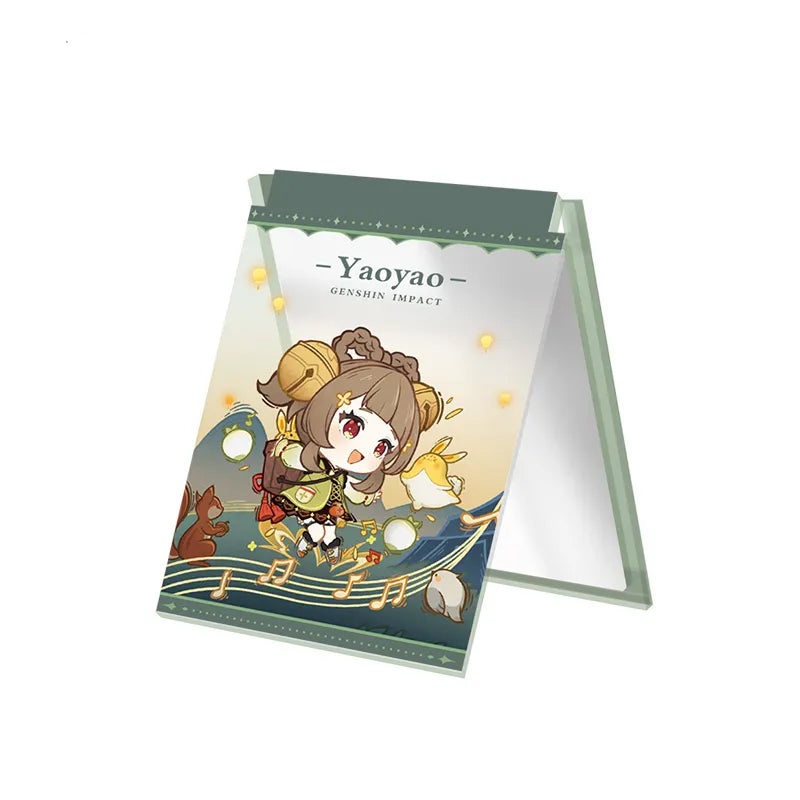 Chibi-style acrylic folding mirror featuring Yaoyao, with a warm, whimsical design of floating stars and a musical note border. The mirror unfolds into a stand, displaying the character’s name at the top against a plain light pink background