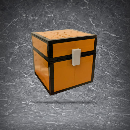 DIY Minecraft-style pixel treasure chest storage box made of building blocks, featuring an opening lid for desk organization.

