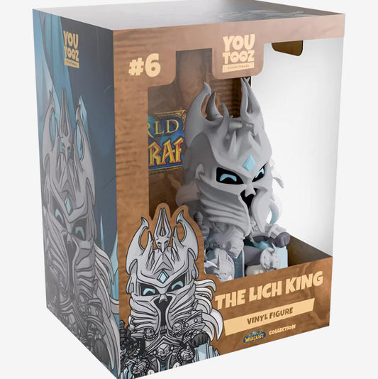 A chibi-style The Lich King vinyl figure sits in its branded window box, showcasing icy armor and glowing blue eyes. Made from smooth, high-quality vinyl, this collectible captures the character’s iconic design.