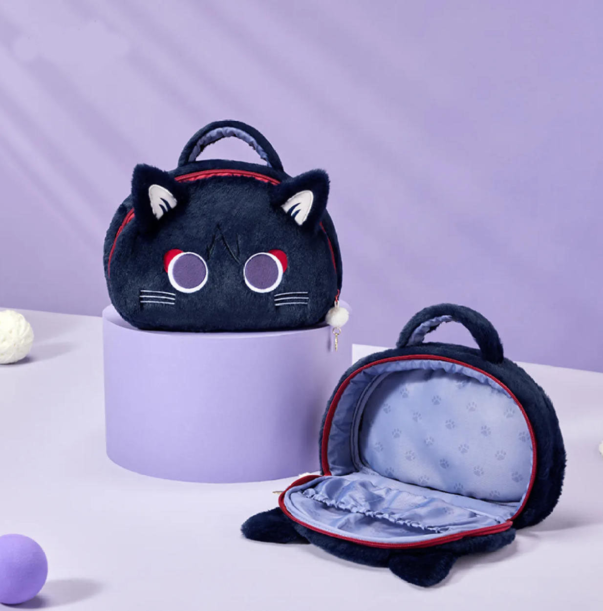 Displays the pouch in both states, highlighting its smooth red zipper, sturdy carry handle, and spacious, paw-print-lined interior for everyday use.